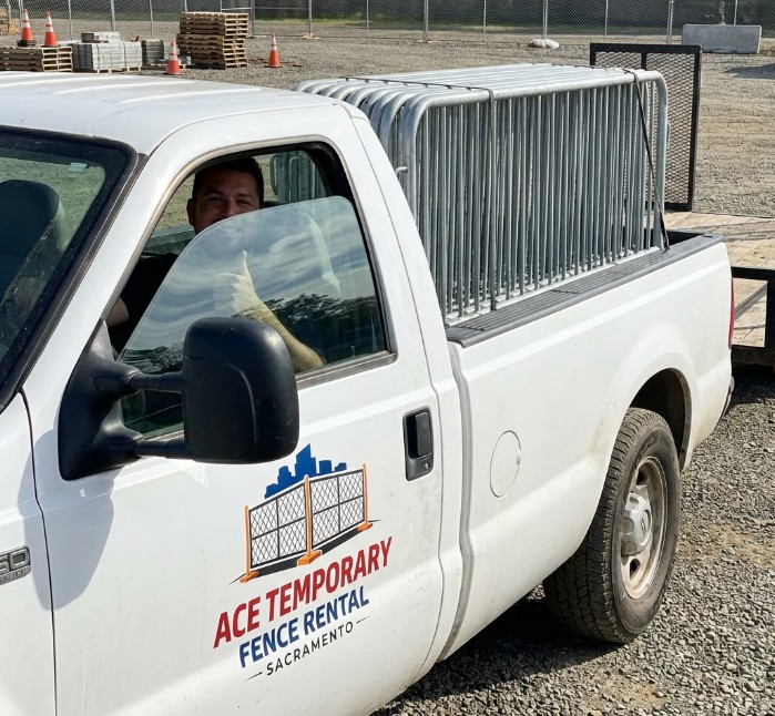 Delivery truck loaded with temporary fence panels